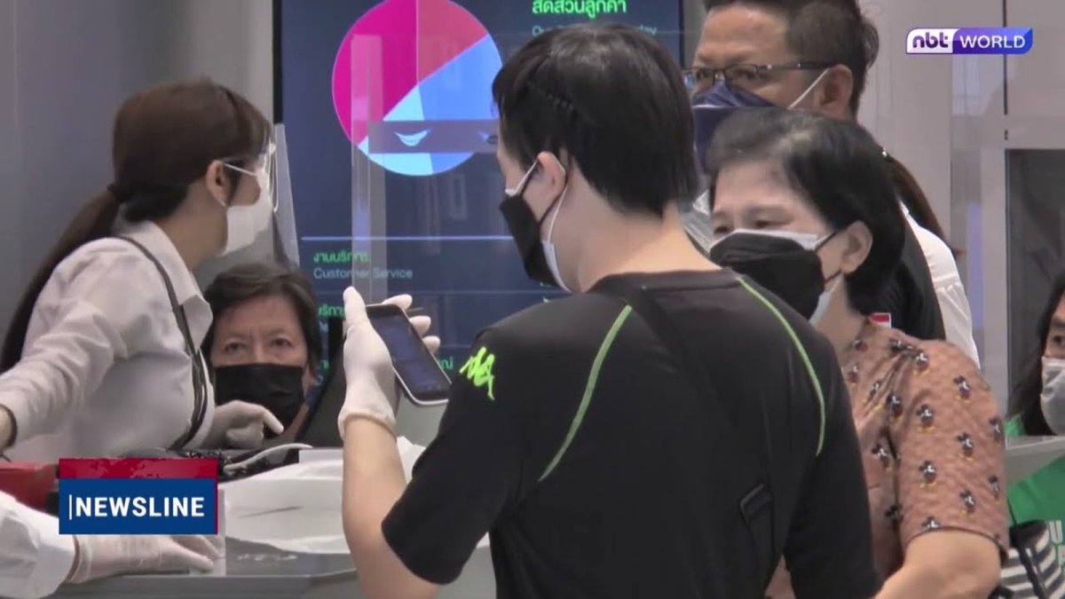Thai police officers at the Anti Online Scam Operation Centre in Bangkok reviewing mule account case files