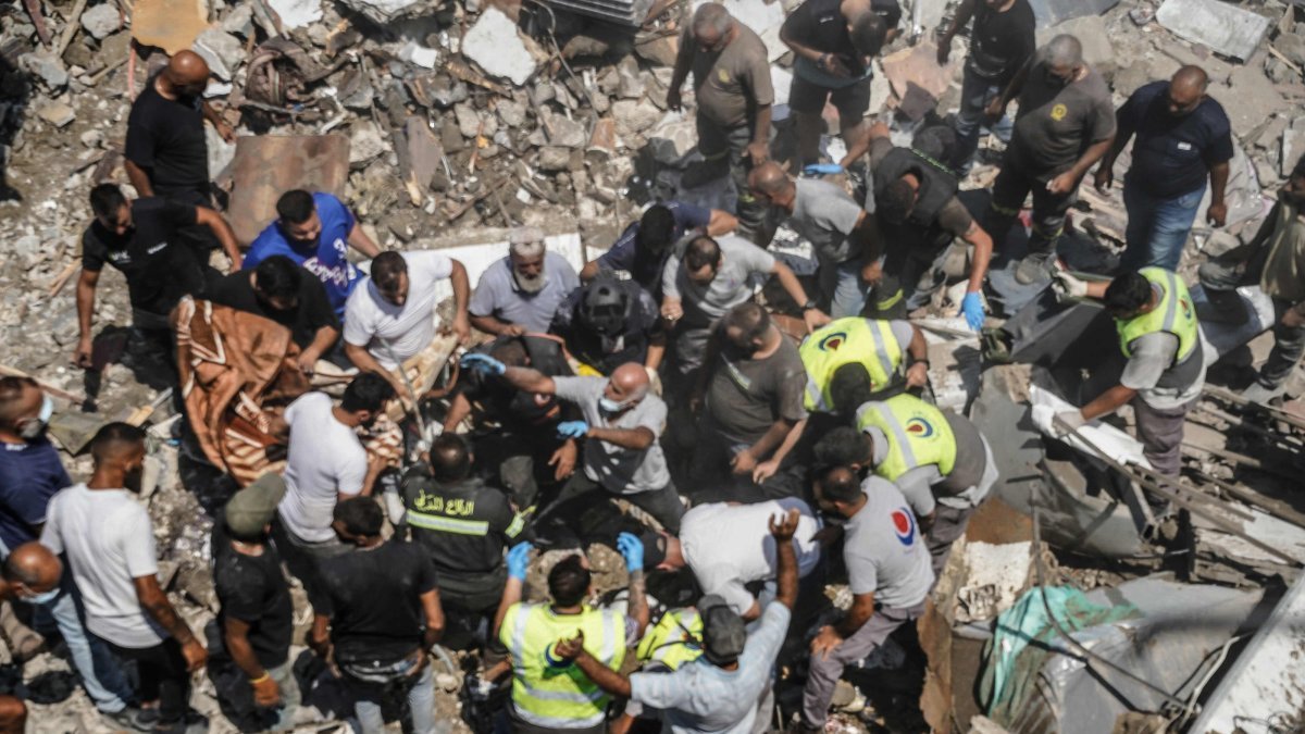 Israeli Strikes Kill 11 in Lebanon as Hezbollah Vows Response