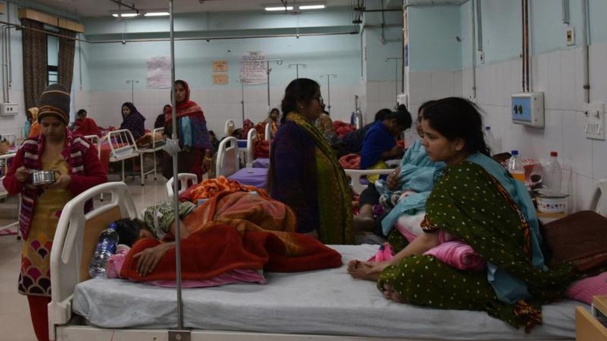 Government hospital corridor with medical equipment in Delhi