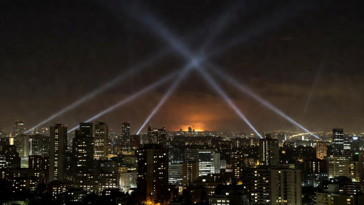 Night skyline with air-defence activity during the Ukraine-Russia aerial campaign