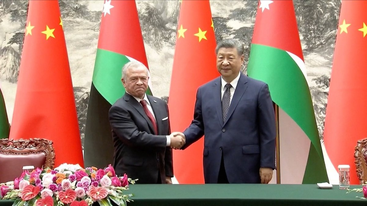 CGTN report footage of the China-Jordan cooperation documents signing ceremony