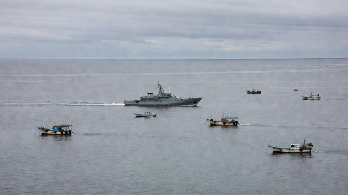 Aerial view of a South Korean coast guard patrol vessel and fishing boats in the Yellow Sea near the Northern Limit Line