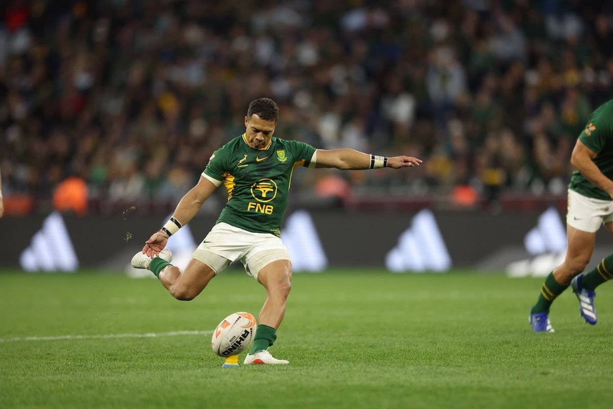 Cheslin Kolbe kicks a penalty for the Springboks against the All Blacks