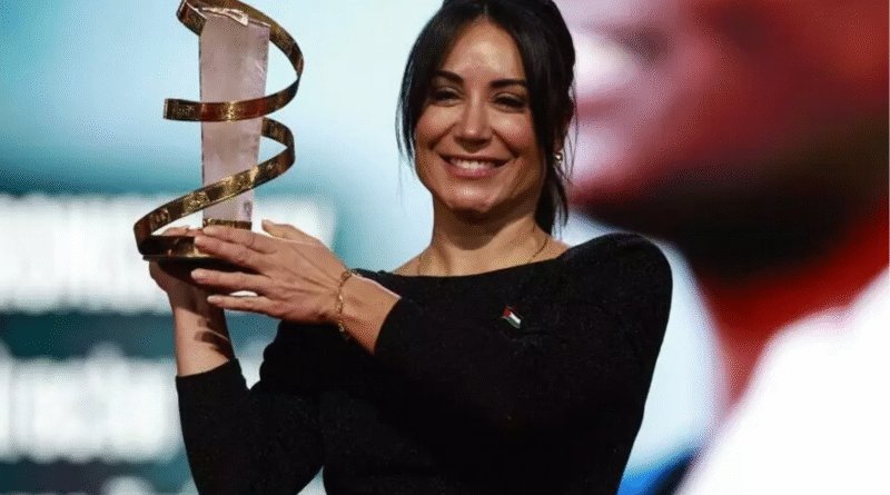Tunisian director Erige Sehiri holds the Golden Star (Etoile d'Or) won by Promised Sky at the Marrakech Film Festival