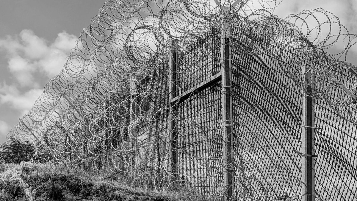 Barbed wire barrier on a hill in the occupied West Bank
