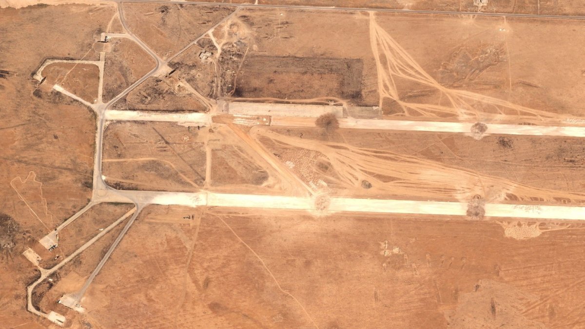Satellite image showing craters on the runways of Abu al-Duhur airbase after Israeli strike