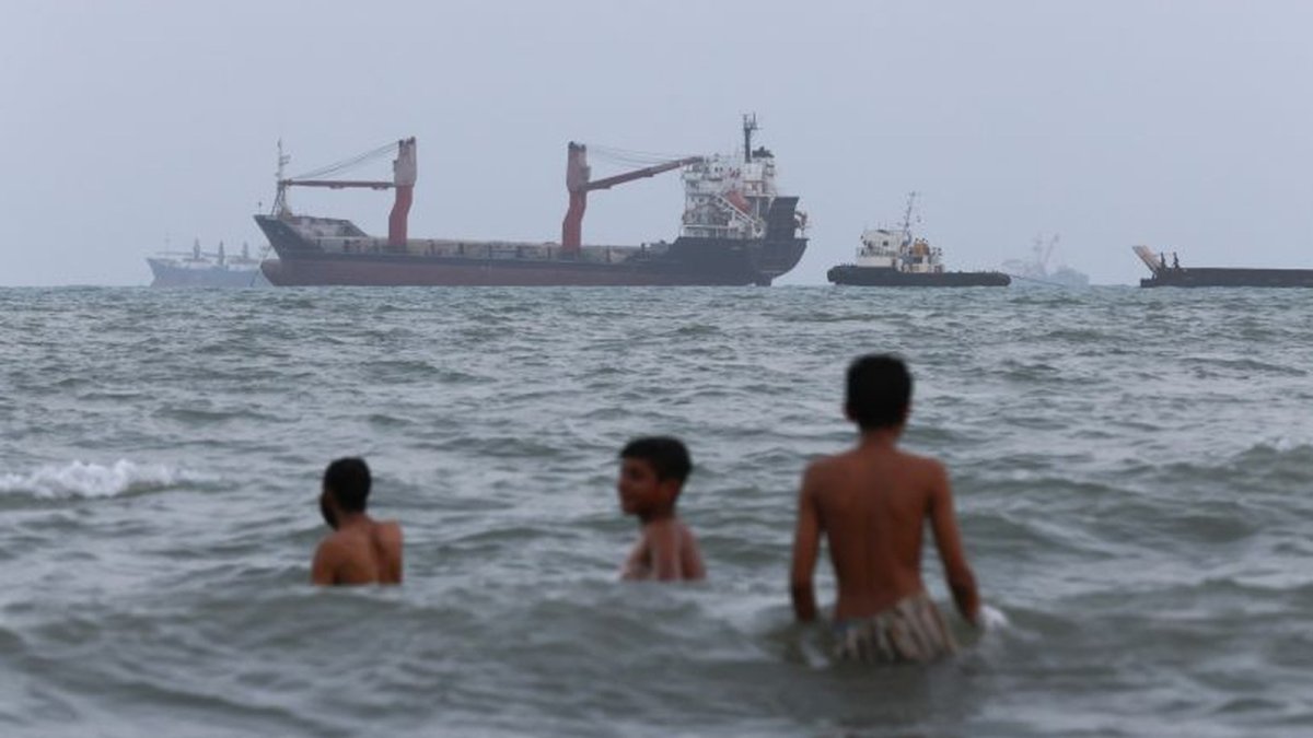 Ships anchored in the Strait of Hormuz off the coast of Bandar Abbas, Iran