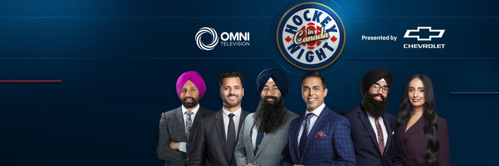 CBC broadcasters in a studio setting