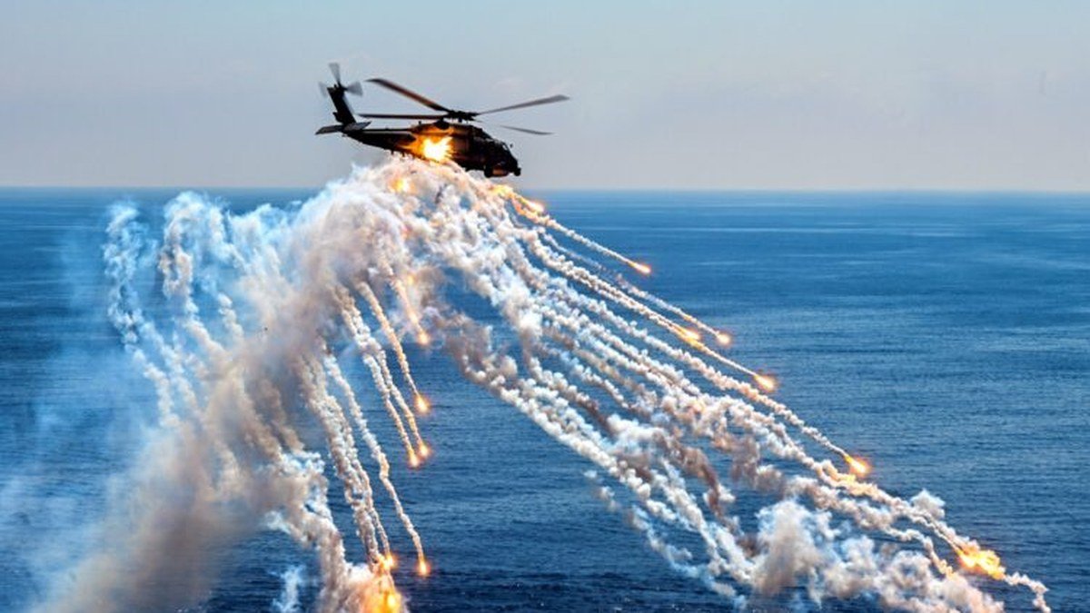 Turkish military helicopter taking part in a drill over the sea