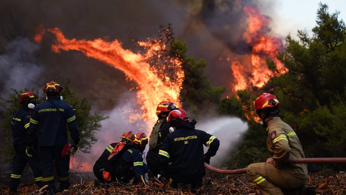 Greek firefighters battle wildfires near Athens as a second blaze forces evacuations on Kefalonia