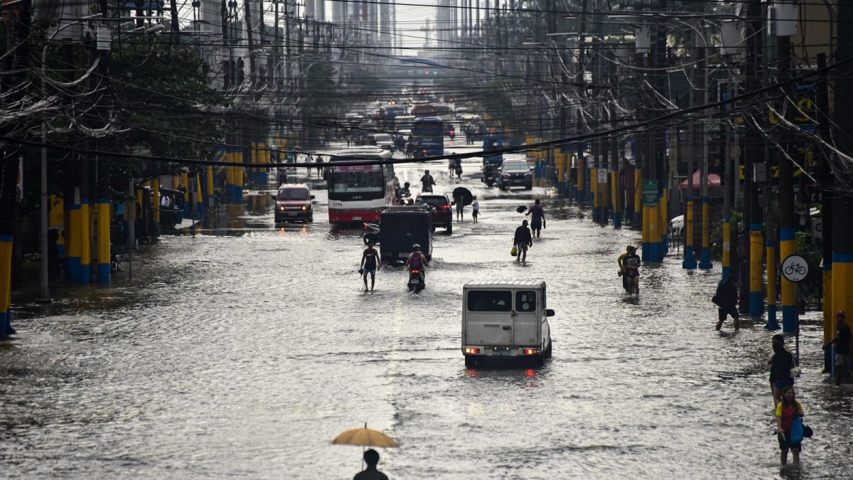 Flooded streets in Cavite as the enhanced southwest monsoon brings heavy rain to Luzon