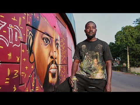 Colorful graffiti murals transforming Conakry's concrete walls into an open-air gallery