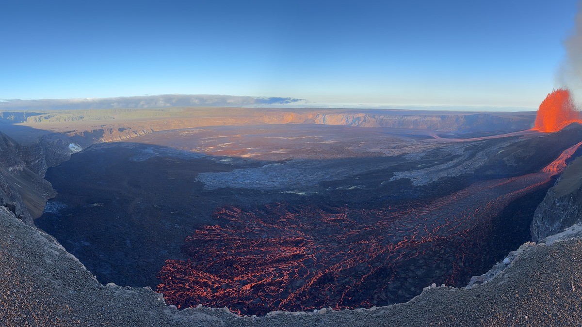 Panorama of Halema'uma'u crater during Kilauea summit eruption episode 53 on 12 August 2026, with lava fountaining and a spatter-fed flow along the crater floor. Photo: M. Patrick/USGS