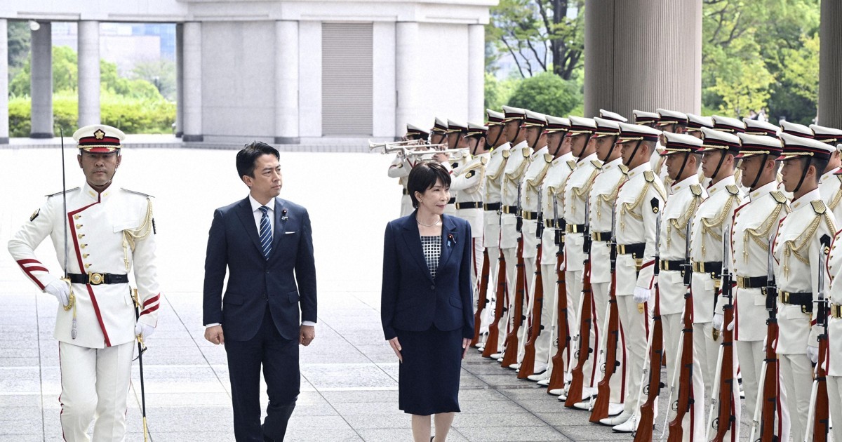 Prime Minister Sanae Takaichi and Defence Minister Shinjiro Koizumi review an honour guard at Japan's Defence Ministry in Tokyo on September 2, 2026.