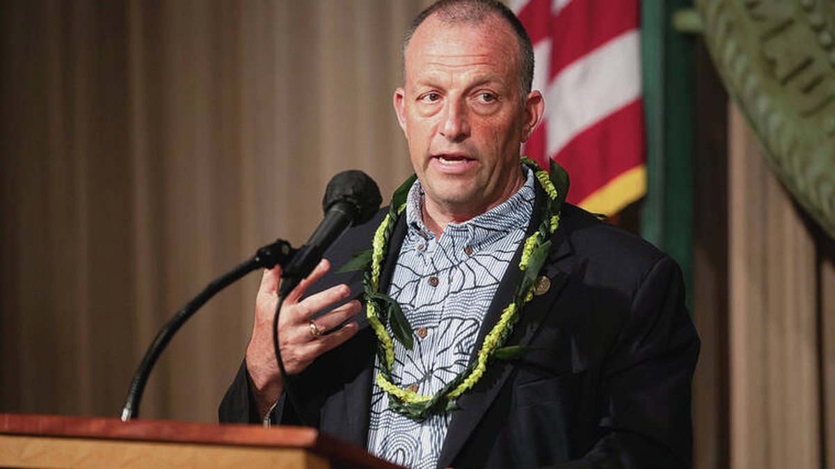 Hawaii Gov. Josh Green speaks at a podium in a 2025 file photograph. Photo: Hawaii Tribune-Herald file