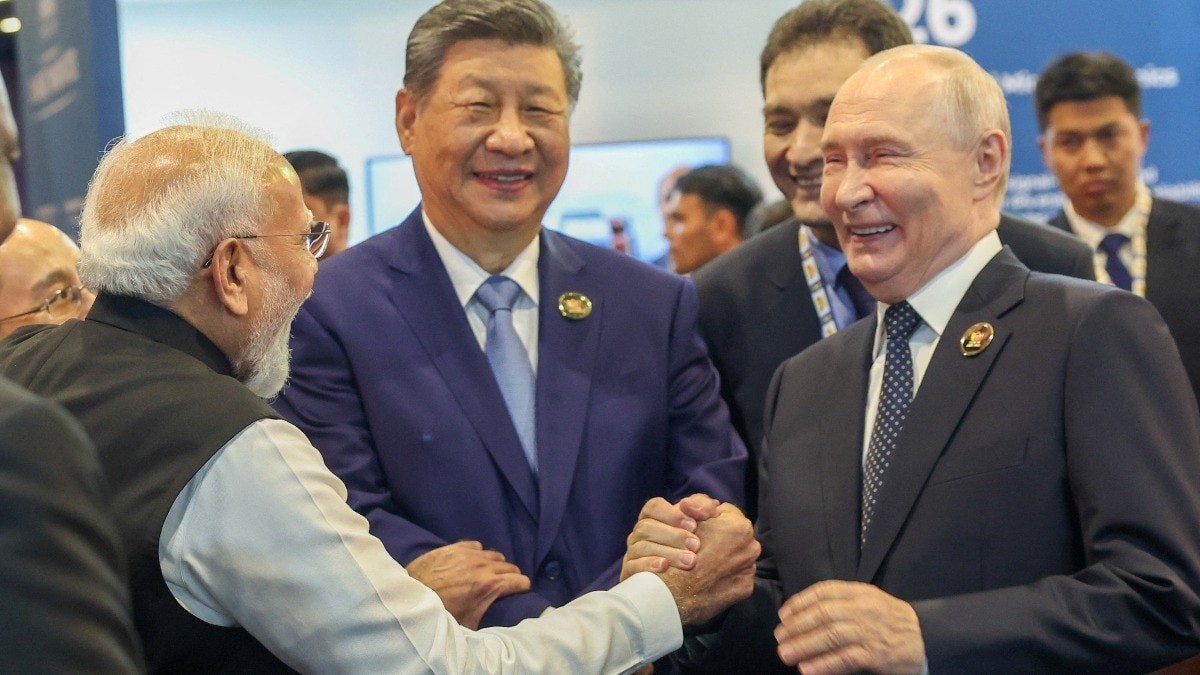 Russian President Vladimir Putin, Prime Minister Narendra Modi and Chinese President Xi Jinping at the BRICS Summit in New Delhi