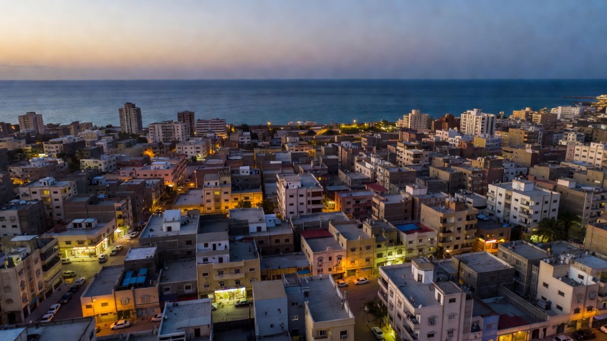 Aerial view of a Middle Eastern city skyline at dusk