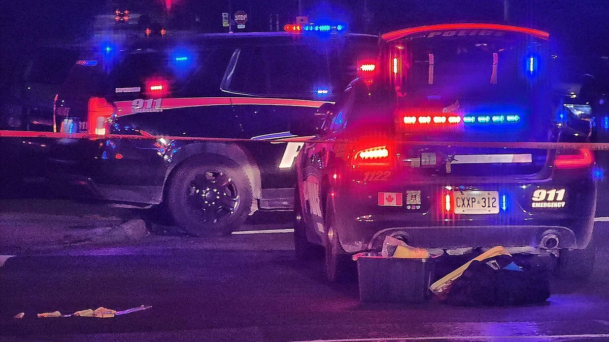 Belleville police cruisers behind yellow police tape at the scene of a shooting outside the Sons of Jacob Synagogue in Belleville, Ontario, on September 20, 2026. Photo: Belleville Intelligencer