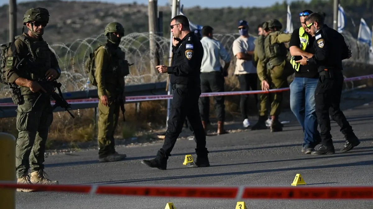 Israeli security forces and police at the cordoned road scene on Route 443 after a car-ramming attack at the Maccabim checkpoint, 23 September 2026. Photo: Yoav Dudkevitch/TPS via Israel National News