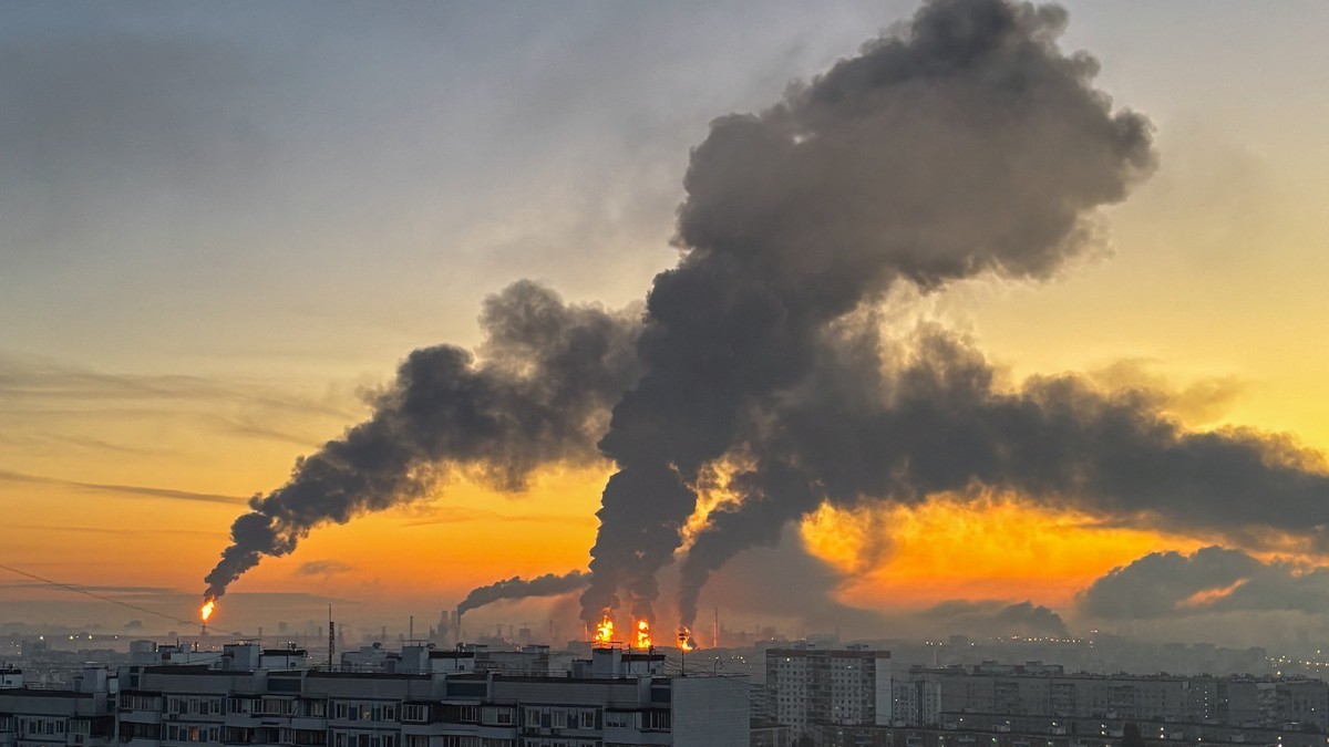 Plumes of smoke rise from fires at an oil refinery in Moscow after what the authorities said was a Ukrainian drone strike on 20 September 2026. Photo: Reuters via Al Jazeera
