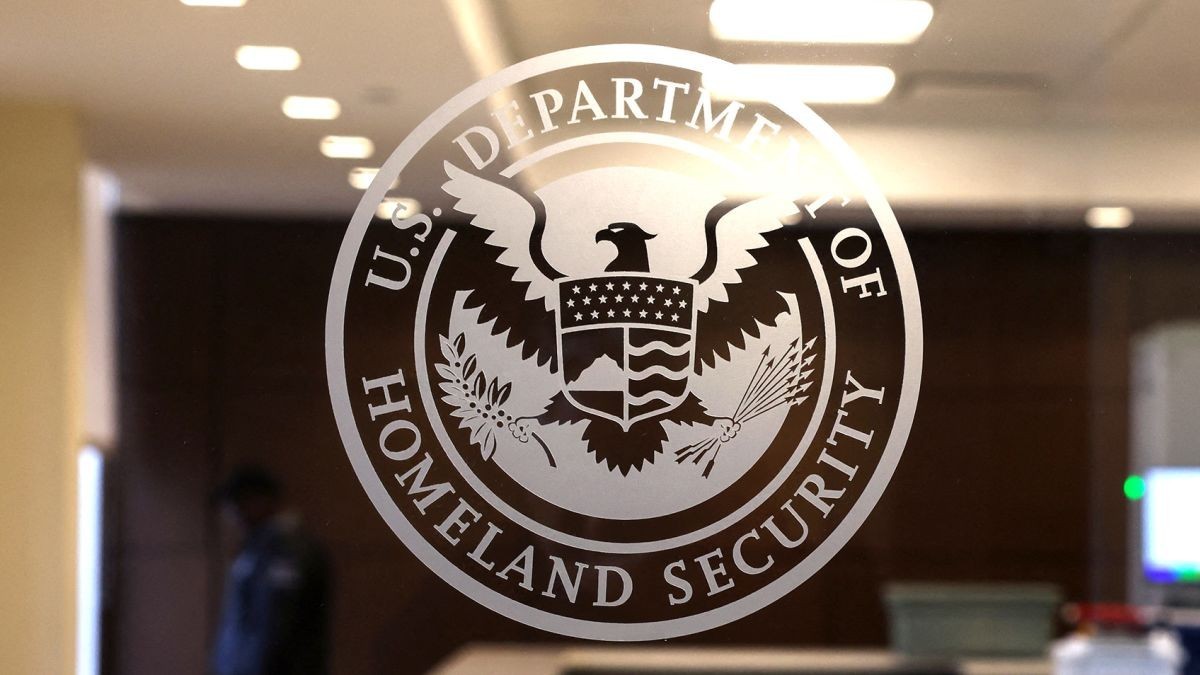 The seal of the U.S. Department of Homeland Security on a glass door at a department facility. Photo: Reuters via CNN