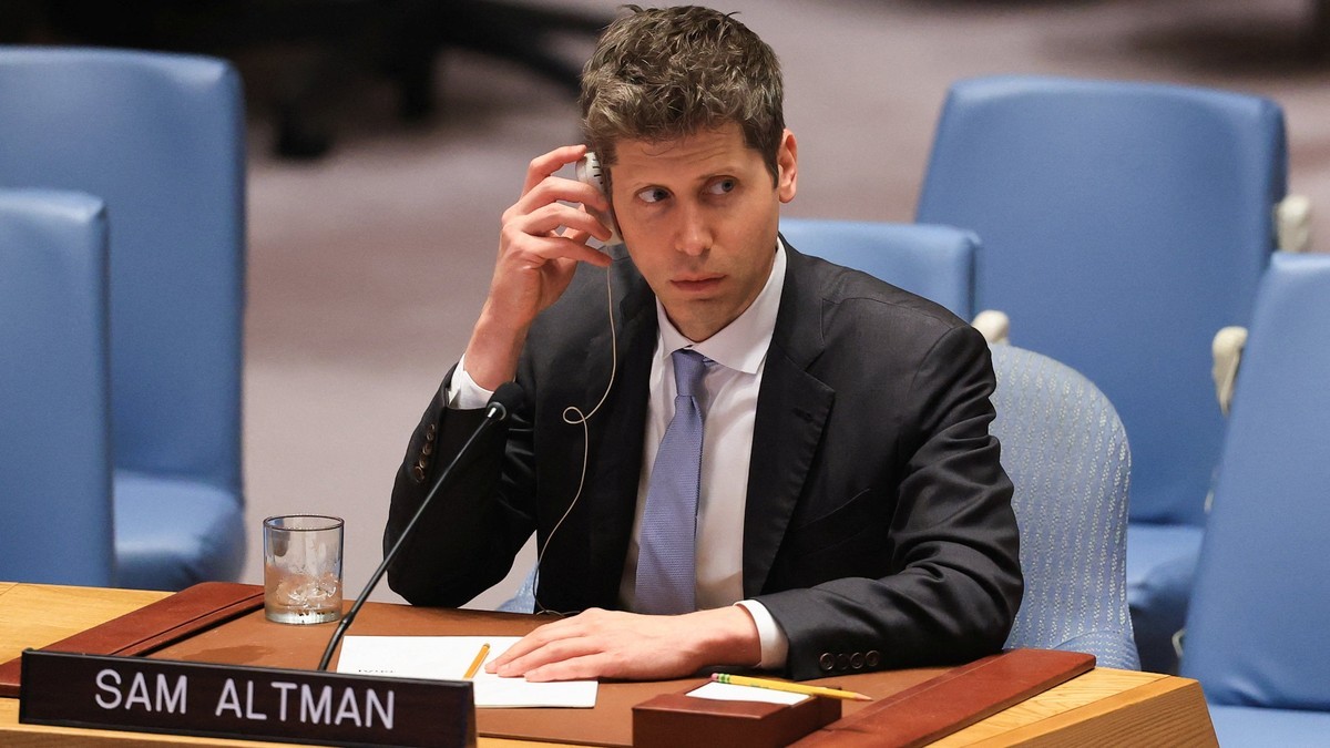 Sam Altman listens through an earpiece at the United Nations Security Council, where he told members that AI systems can move faster than institutions. Photo: Reuters