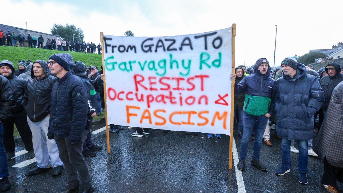 Protesters in Portadown, Northern Ireland, hold a banner reading 'From Gaza to Garvaghy Rd - Resist occupation and fascism' on Sunday 27 September 2026. Photo: AFP via Al Jazeera