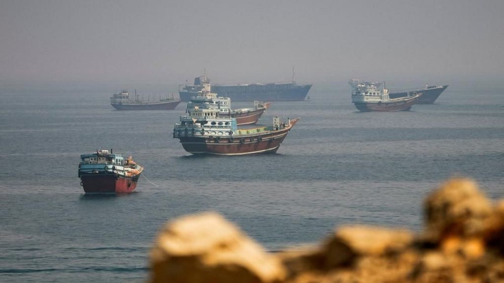 Ships in the waters of the Strait of Hormuz, the strategic waterway through which a fifth of global oil shipments pass