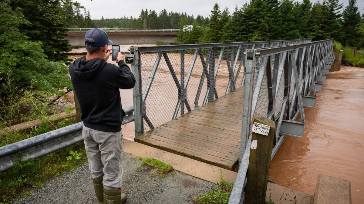 Crews assess damage to roads and infrastructure in Cape Breton, N.S., after severe flooding.