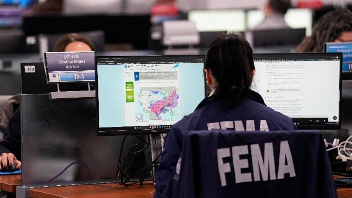 A FEMA worker at a workstation inside the agency's National Response Coordination Center in Washington