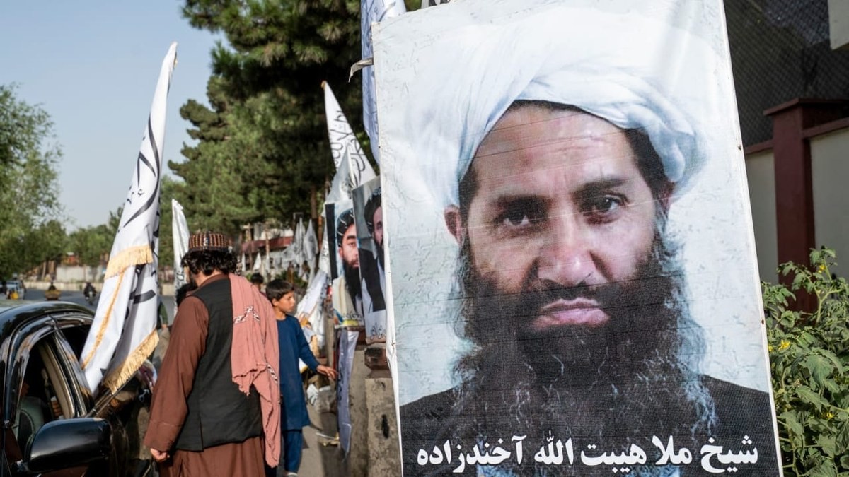 A poster of Taliban Supreme Leader Hibatullah Akhundzada stands beside a road in Kabul on 14 August 2023. Photo: Wakil Kohsar/AFP via Getty Images