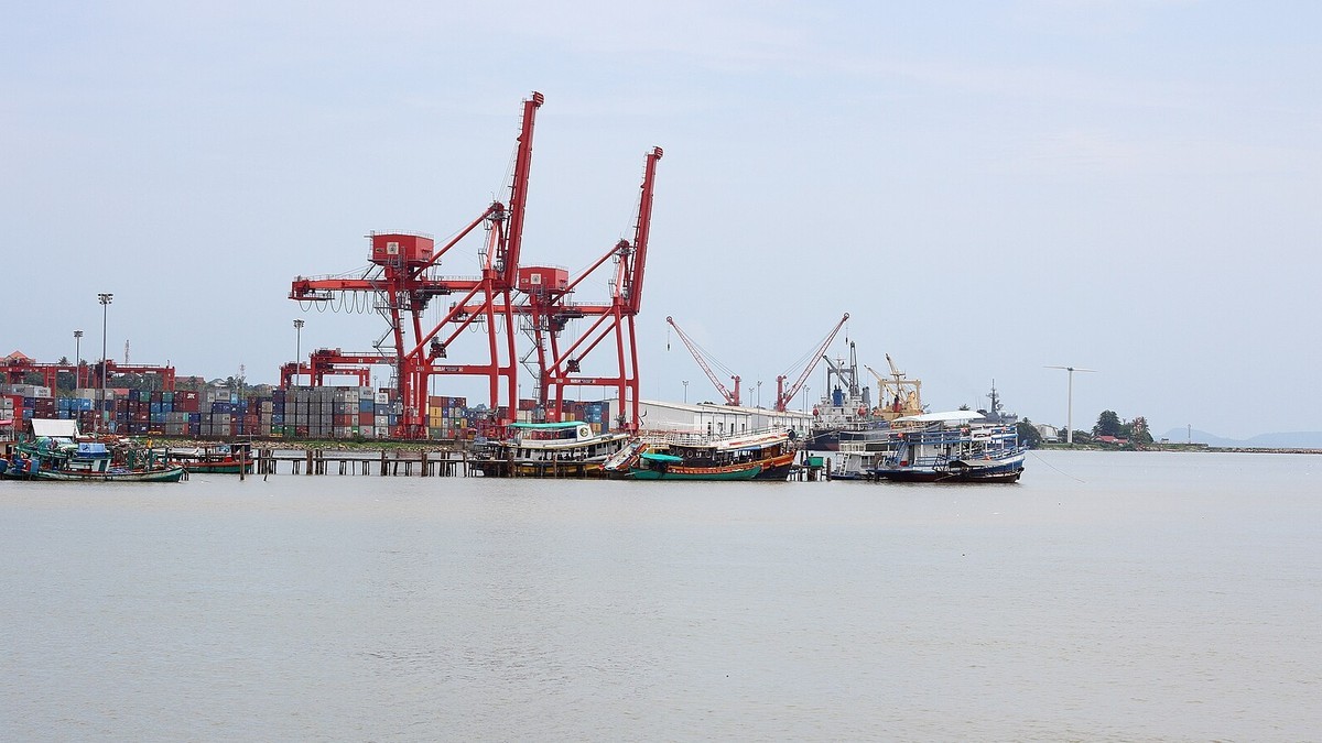 Container gantry cranes and stacked containers at Sihanoukville Autonomous Port in Cambodia, where the Odyssey's residents were disembarked. Photo: Dmitry Makeev / Wikimedia Commons, CC BY-SA 4.0