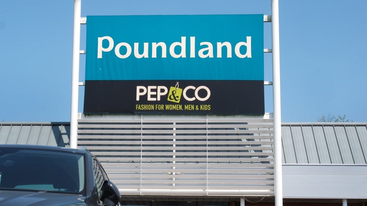 A Poundland store at a retail park in the United Kingdom, with cars parked in front. Photo: Linda Nylind/The Guardian
