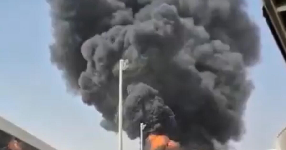 Thick black smoke and flames rise from a fire at King Khalid International Airport in Riyadh on 9 October 2026. Photo: AP via the Los Angeles Times