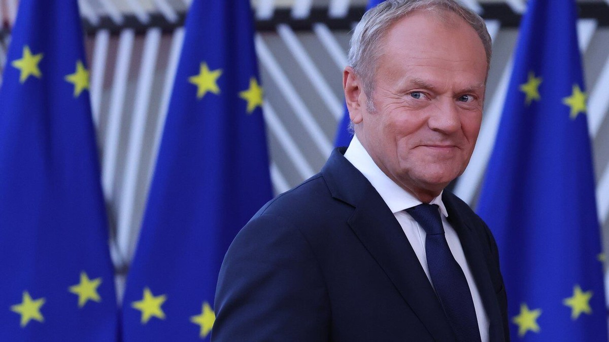 Poland's Prime Minister Donald Tusk in front of European Union flags at a summit in Brussels. Photo: Omar Havana/Associated Press