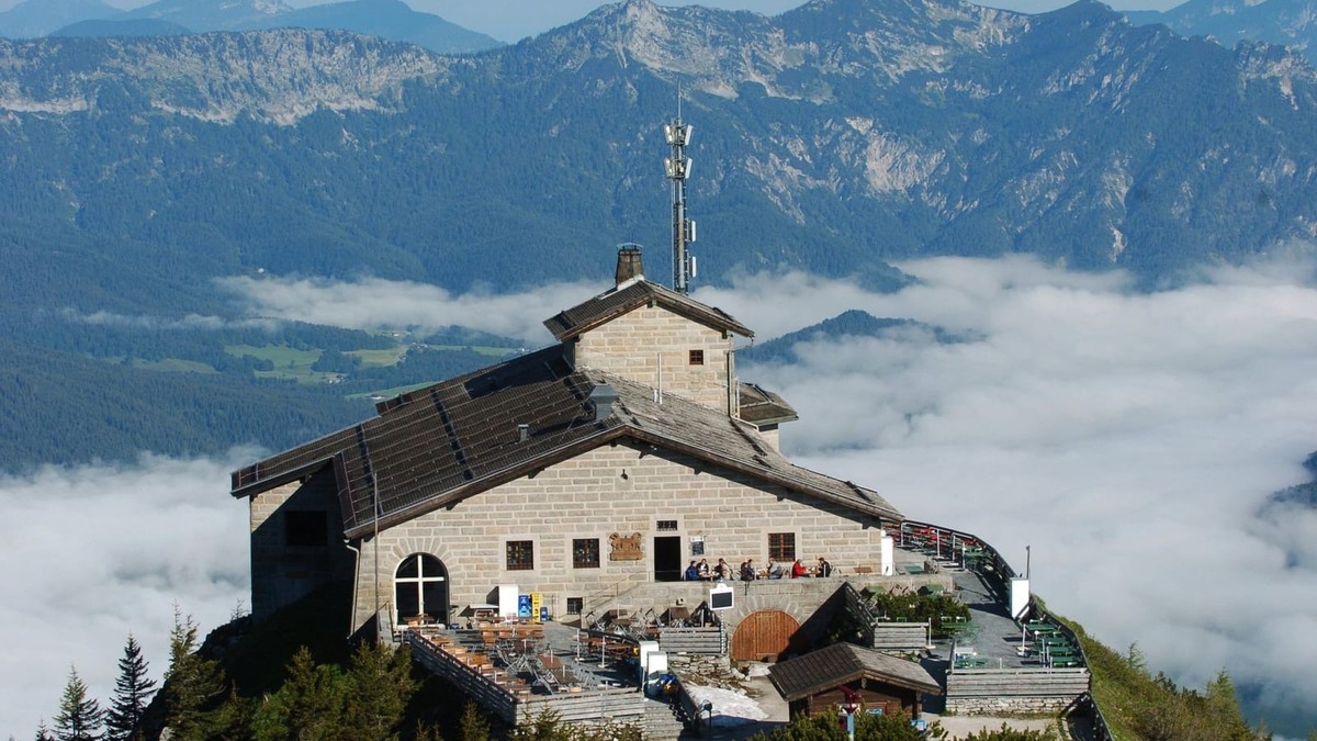 The Kehlsteinhaus on its summit above Berchtesgaden before the fire, with its stone facade and terrace overlooking the Bavarian Alps. Photo: Peter Kneffel/dpa via t-online