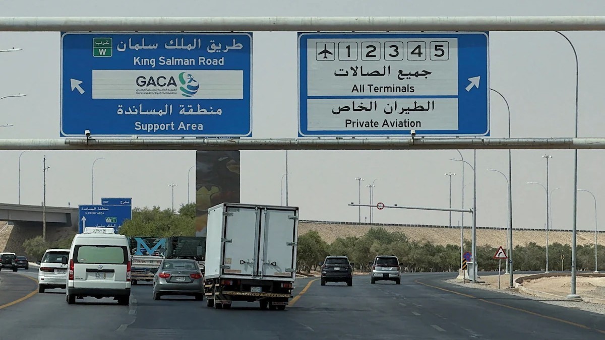 Vehicles pass overhead signs for King Salman Road and the General Authority of Civil Aviation serving King Khalid International Airport in Riyadh. Photo: The Globe and Mail