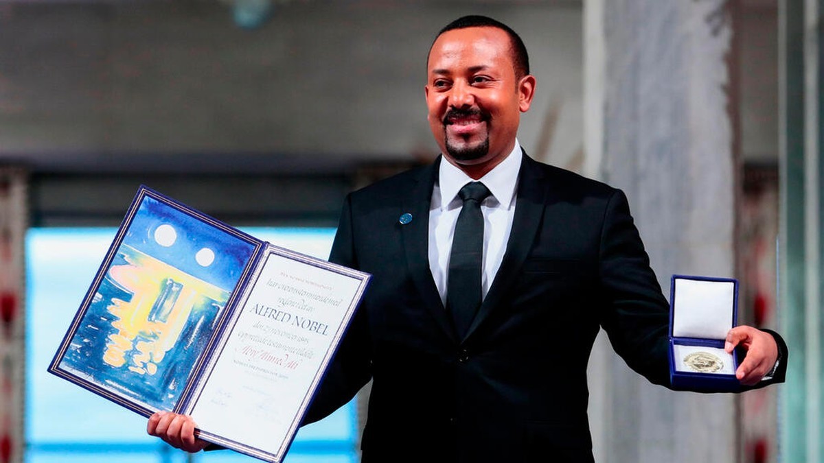 Ethiopia's Prime Minister Abiy Ahmed holds his Nobel Peace Prize diploma and medal after the 2019 award ceremony in Oslo, which recognised the rapprochement with Eritrea. Photo: AFP