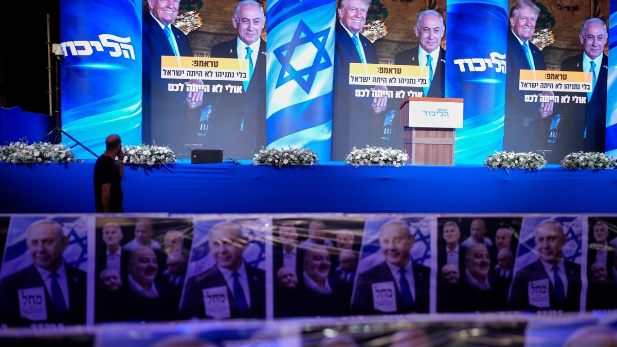 The Likud election-night stage in Jerusalem, its screens showing Donald Trump and Benjamin Netanyahu before the first exit polls were published, 27 October 2026. Photo: AP via NPR