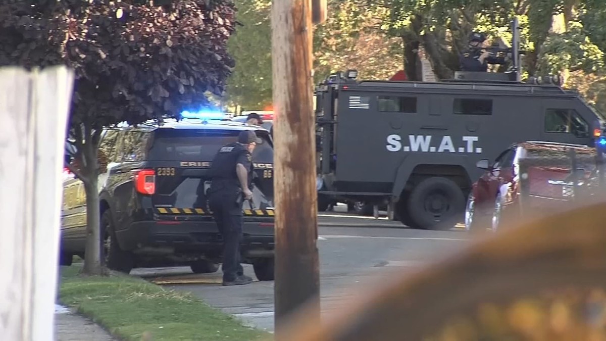 A SWAT armored vehicle moves along a residential street in Erie, Pennsylvania, during the police response on October 9, 2026. Photo: WPXI