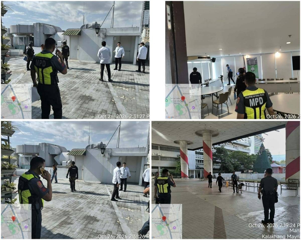 Manila Police District and Philippine National Police officers, with an explosives-detection dog, sweep the De La Salle University-Manila campus on 26 October 2026. Photo: Manila Times