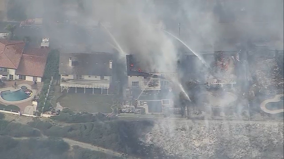 Aerial view of a hillside home burning in the Norte Fire near San Juan Capistrano, California, on Oct. 16, 2026. Image: ABC7 Eyewitness News (AIR7)