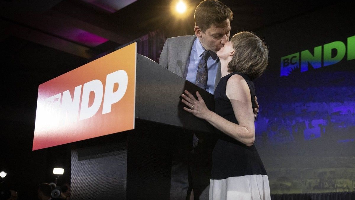 B.C. NDP Leader David Eby kisses his wife Cailey Lynch during his concession speech in Vancouver on October 24, 2026. Photo: Jason Payne/Postmedia