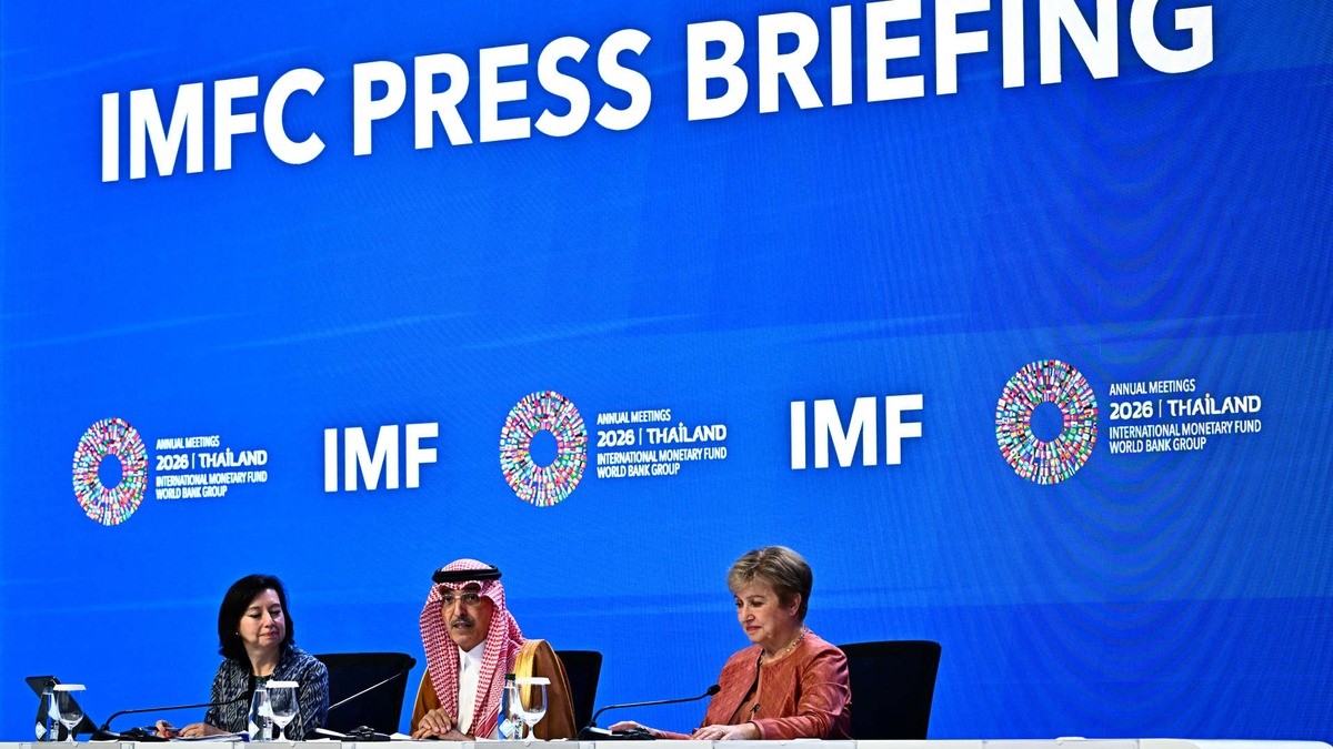 IMF Communications Director Julie Kozack, Saudi Finance Minister and IMFC chairman Mohammed al-Jadaan and IMF Managing Director Kristalina Georgieva at the IMFC press briefing during the 2026 annual meetings in Bangkok. Photo: Lillian Suwanrumpha/AFP via Getty Images