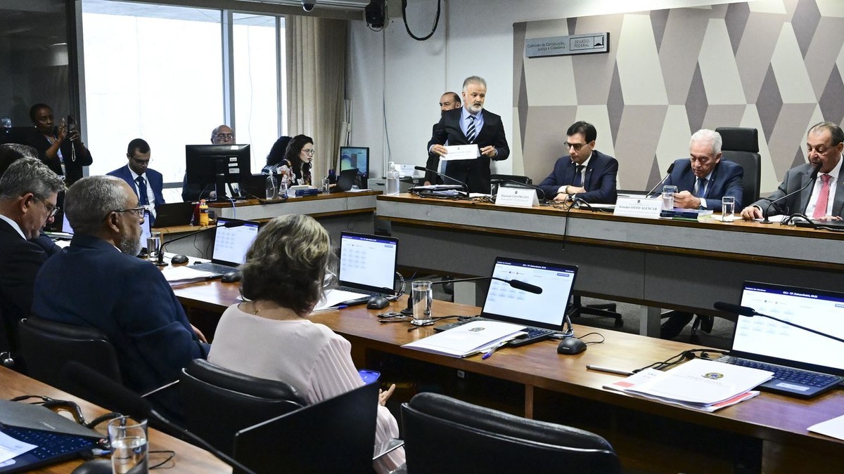 Senators seated at desks during a committee session in the Brazilian Senate in Brasilia. Photo: Geraldo Magela/Agencia Senado