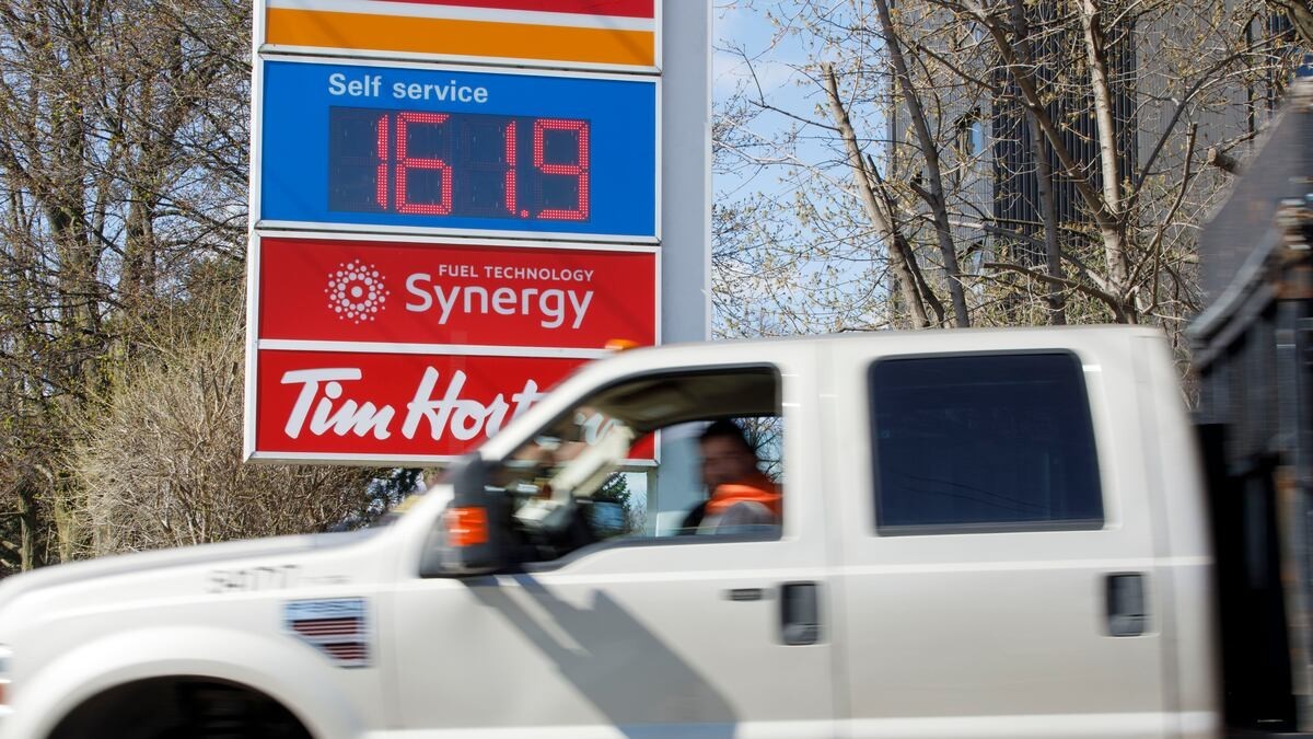 A driver passes an Esso station price sign in Toronto in April 2026. Gasoline prices across Canada were up 27.8 per cent year over year in September. Photo: Oksana Shtohryn/CBC