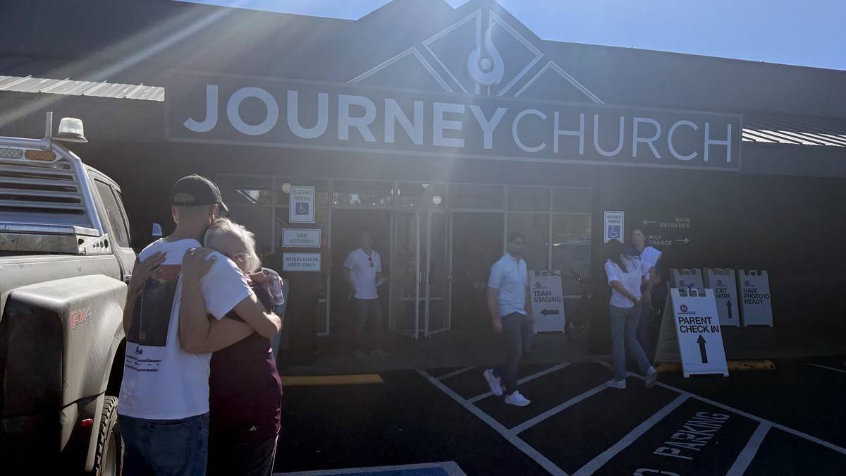 Families gather at Journey Church in Bend, Oregon, where a reunification center was set up for Silver Rail Elementary families on Oct. 15, 2026. Photo: Eleanor Moseman / Oregon Public Broadcasting